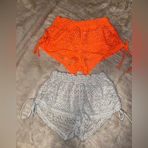 Two pairs of swimsuit, cover-up shorts